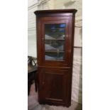 Mahogany Corner Cabinet, circa late 19th century, Having a Glazed Door enclosing a Shelved