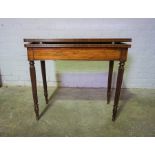 Mahogany Fold Over Card Table, Enclosing a Green Felt Lined Interior, Raised on Reeded Legs, 74cm