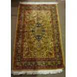 Persian Style Rug, Decorated with Floral Medallions on a Red and Yellow Ground, 154cm x 92cm