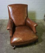 Tetrad Brown Leather Library Armchair, Raised on Turned Supports with Brass Castors, Label to