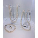 String of Cultured Pearls with Matching Bracelet, Having a Silver clasp, Stamped 925, Necklace