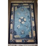 Three Chinese Style Rugs, Decorated with Floral Medallions on a Pale Blue Ground, 110cm x 64cm,