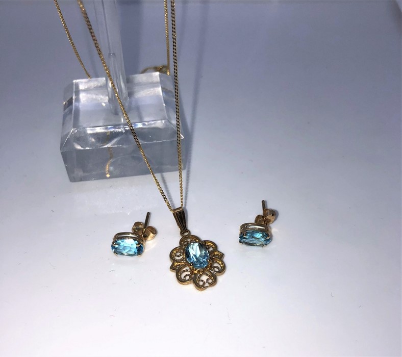 9ct Gold and Gemstone Ladies Pendant on Chain, With Matching Earrings, The Gems are possibly Blue