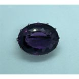 Amethyst Faceted Cut Brooch, Set with an oval Amethyst Cabochon, Measuring approximately 20mm,