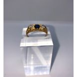 18ct Gold Sapphire and Diamond Ladies Three Stone Ring, Set with a Sapphire to the centre, Flanked
