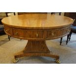 Regency Style Drum Library Table, 20th century, Having Drawers and Faux Drawers, Raised on a Faceted