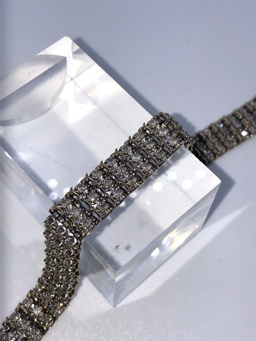 Diamond Tennis Bracelet, Set with approximately 135 Brilliant cut Diamonds, Measuring
