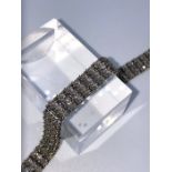 Diamond Tennis Bracelet, Set with approximately 135 Brilliant cut Diamonds, Measuring