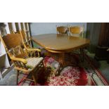 Continental Oak Extending Dining Table, With a set of Eight Spindle Back Chairs, 20th century, Table