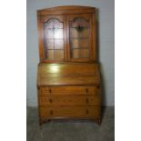 Oak Bureau Bookcase, circa 1930s / 40s, Having two Stained Leaded Glass Doors, Above a Fall Front