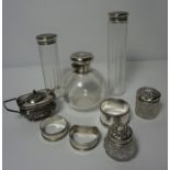 Mixed Lot of Silver, Comprising of five assorted Silver Topped Toilet Bottles, Two Silver Napkin