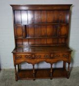 Georgian Style Oak Dresser, Having open Shelving, Flanked with two Doors above three small Drawers