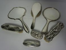 Five Silver Backed Dressing Table Items, circa early 20th century, To include Hand Mirrors and