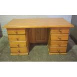 Pine Kneehole Desk, Having four small Drawers to each Pedestal, 76cm high, 150cm wide, 80cm deep