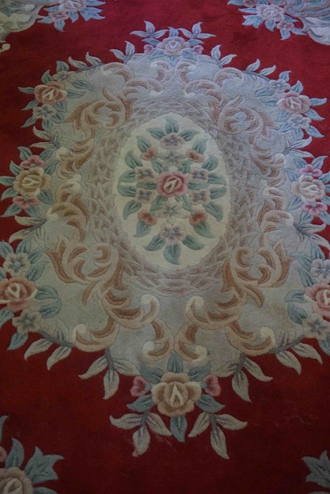 Chinese Style Rug, Decorated with Floral Medallions and Motifs on a Red ground, 290cm x 190cm - Image 2 of 5