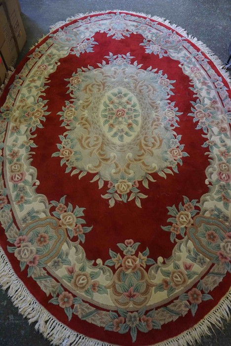 Chinese Style Rug, Decorated with Floral Medallions and Motifs on a Red ground, 290cm x 190cm