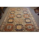 Turkish Herekeh Rug, Decorated with six rows of three Geometric Medallions on a Beige ground,