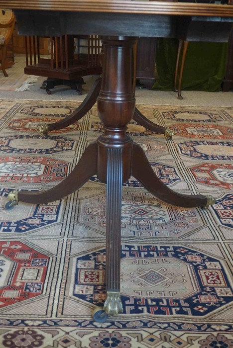 Regency Style Mahogany Twin Pedestal Dining Table, Raised on Brass Animal Paw Sabots with Castors, - Image 6 of 9