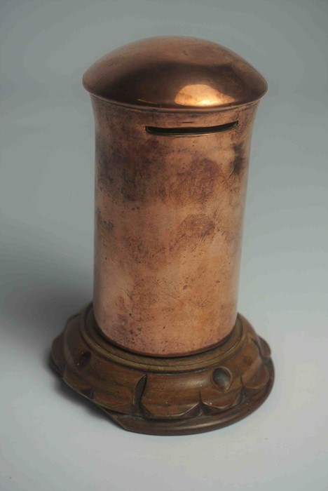 Copper Coin Bank, Modelled as a Post Box, Raised on a Wooden stand, 14cm high