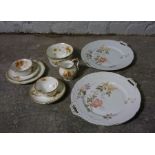 Floral China Tea Set, Approximately 35 pieces, Also with a pair of Limoges style Biscuit Plates, (