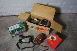 Box of Cameras, Projector and Accessories