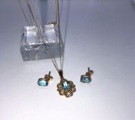 9ct Gold and Gemstone Ladies Pendant on Chain, With Matching Earrings, The Gems are possibly Blue