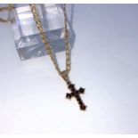 9ct Gold and Garnet Ladies Cross Pendant, On a 9ct Gold Chain, Set with 9 Graduated Garnets, Stamped