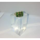 9ct Gold Gemstone and Diamond Ladies Ring, Set with 9 Green Stones possibly Peridot, Flanked with
