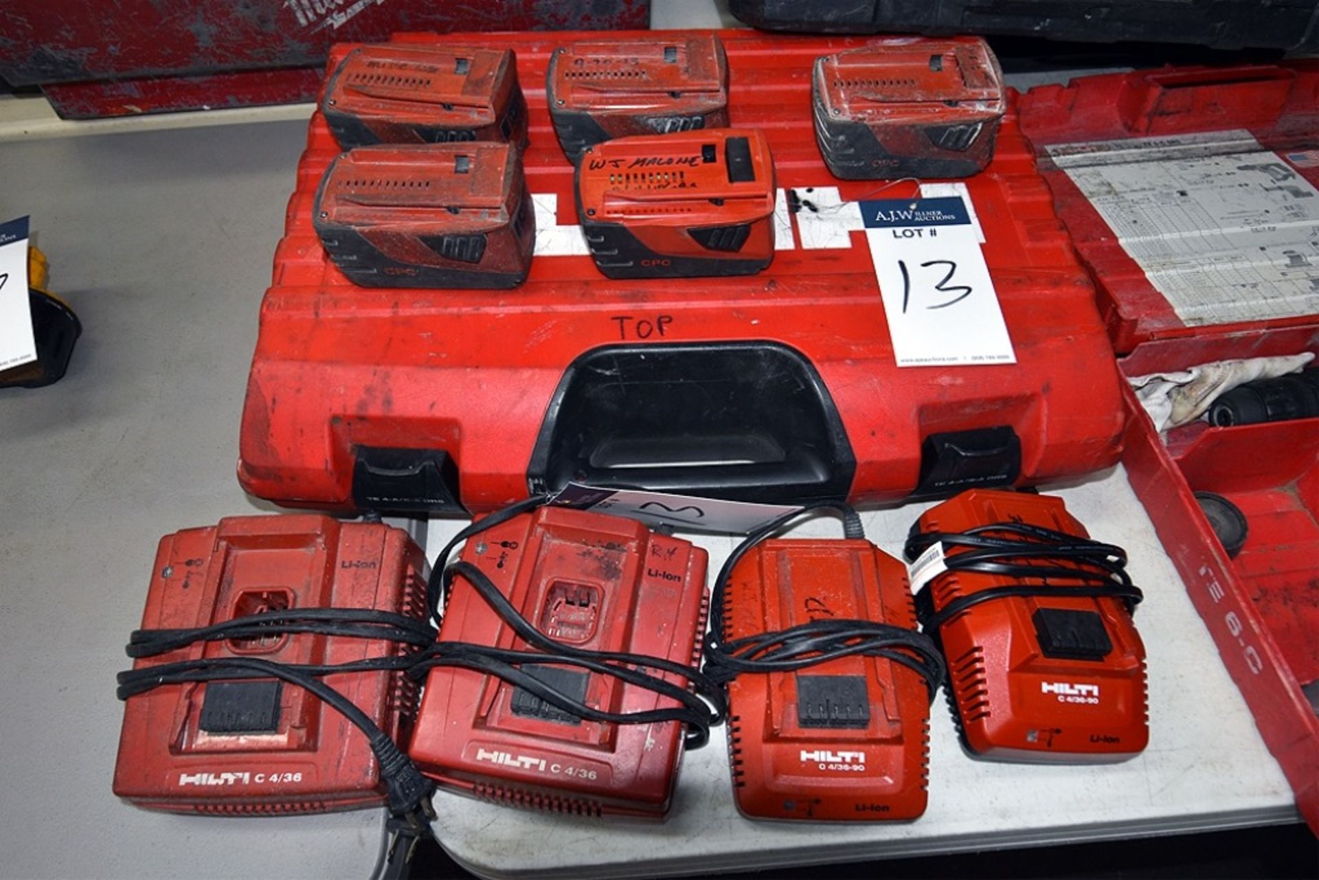 (5) Hilti 21.6v Lithium Ion Batteries, (4) Hilti Chargers, and (1) Hilti Case