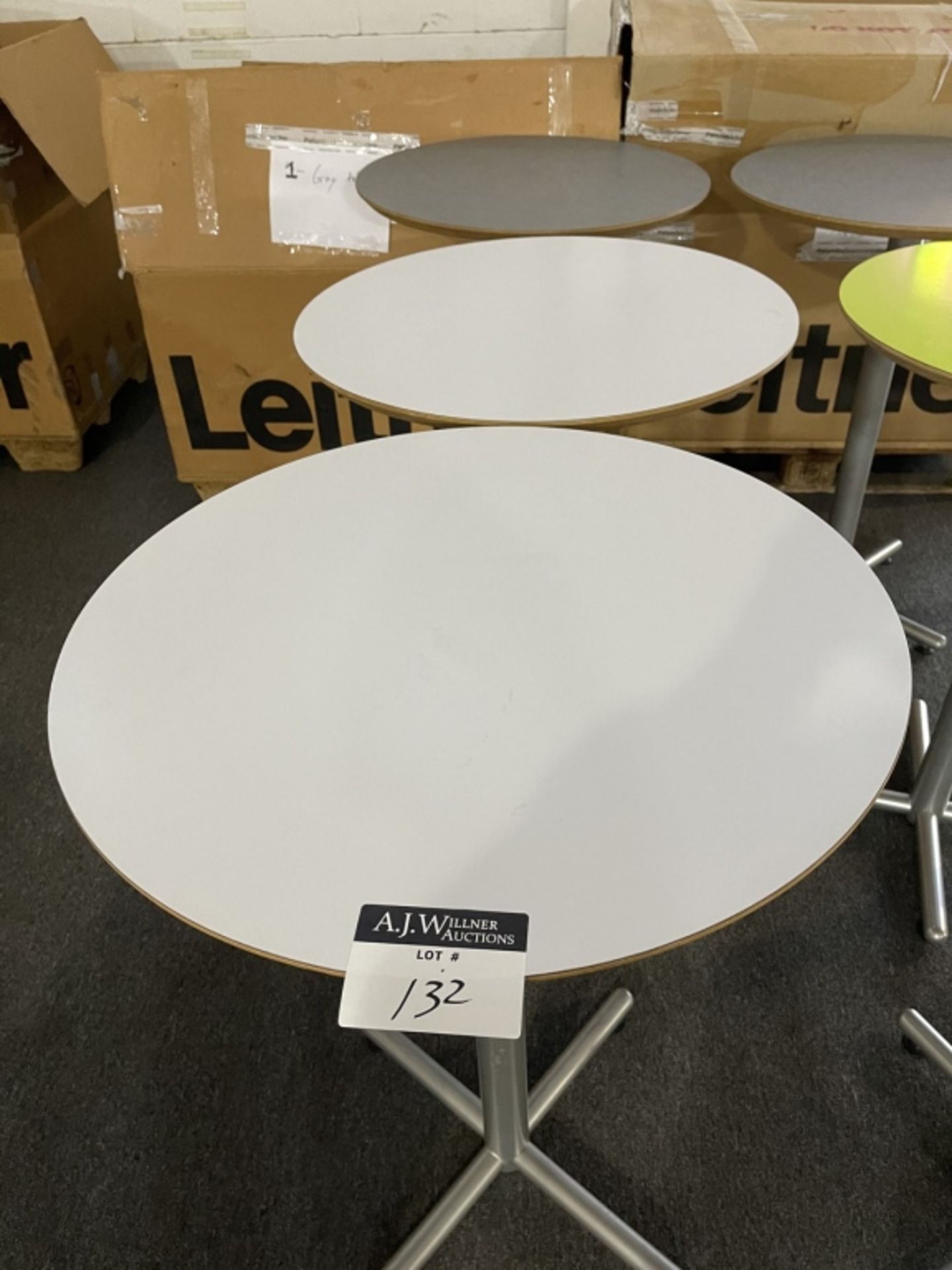 {each} 27" Round Tables on Chrome base