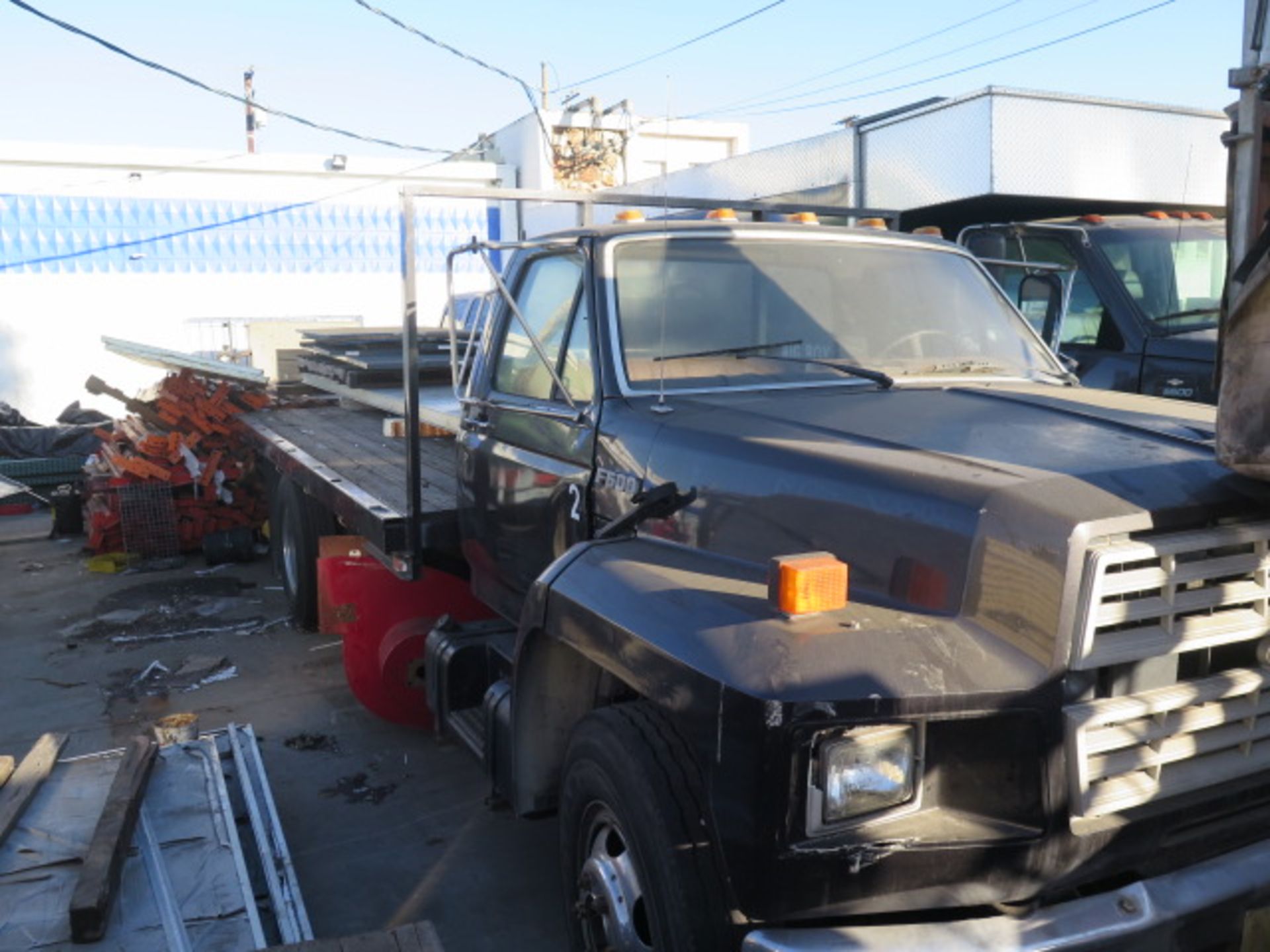 1989 Ford F600 16’ Stake Bed Truck Lisc# 76B 3AA (Missouri Plates) w/ 370-2V Gas Engine, Automatic