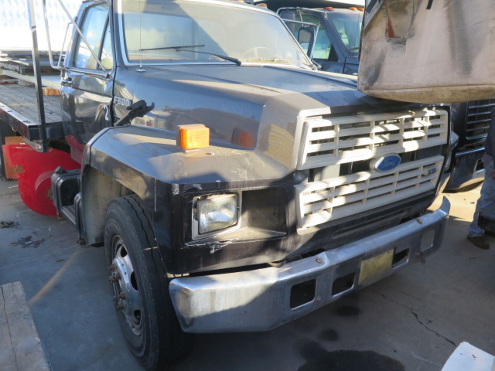 1989 Ford F600 16’ Stake Bed Truck Lisc# 76B 3AA (Missouri Plates) w/ 370-2V Gas Engine, Automatic - Image 2 of 8