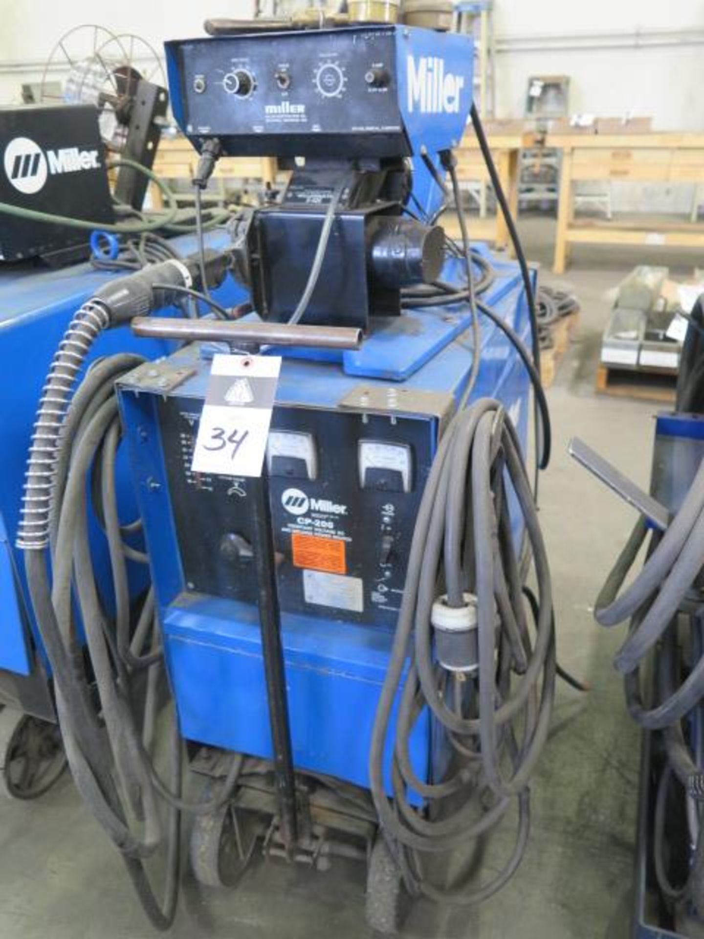 Miller CP-200 CV-DC Arc Welding Power Source s/n JH229352 w/ Miller S-52E Wire Feeder SOLD AS-IS