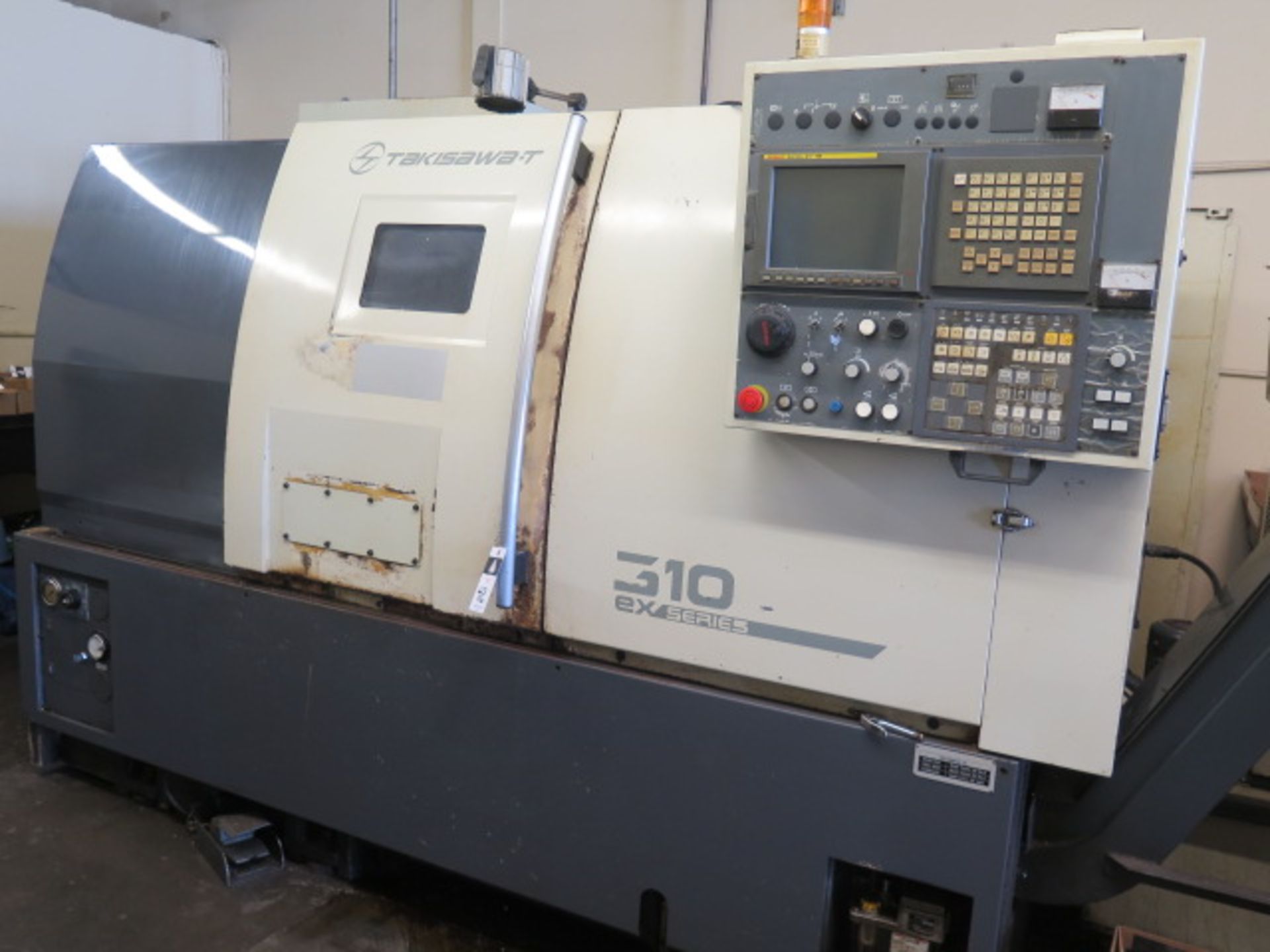 Takisawa-T EX-310 Live Turret CNC Turning Center s/n CW07E40035 w/ Fanuc Series 21i-TB, (SOLD AS IS)