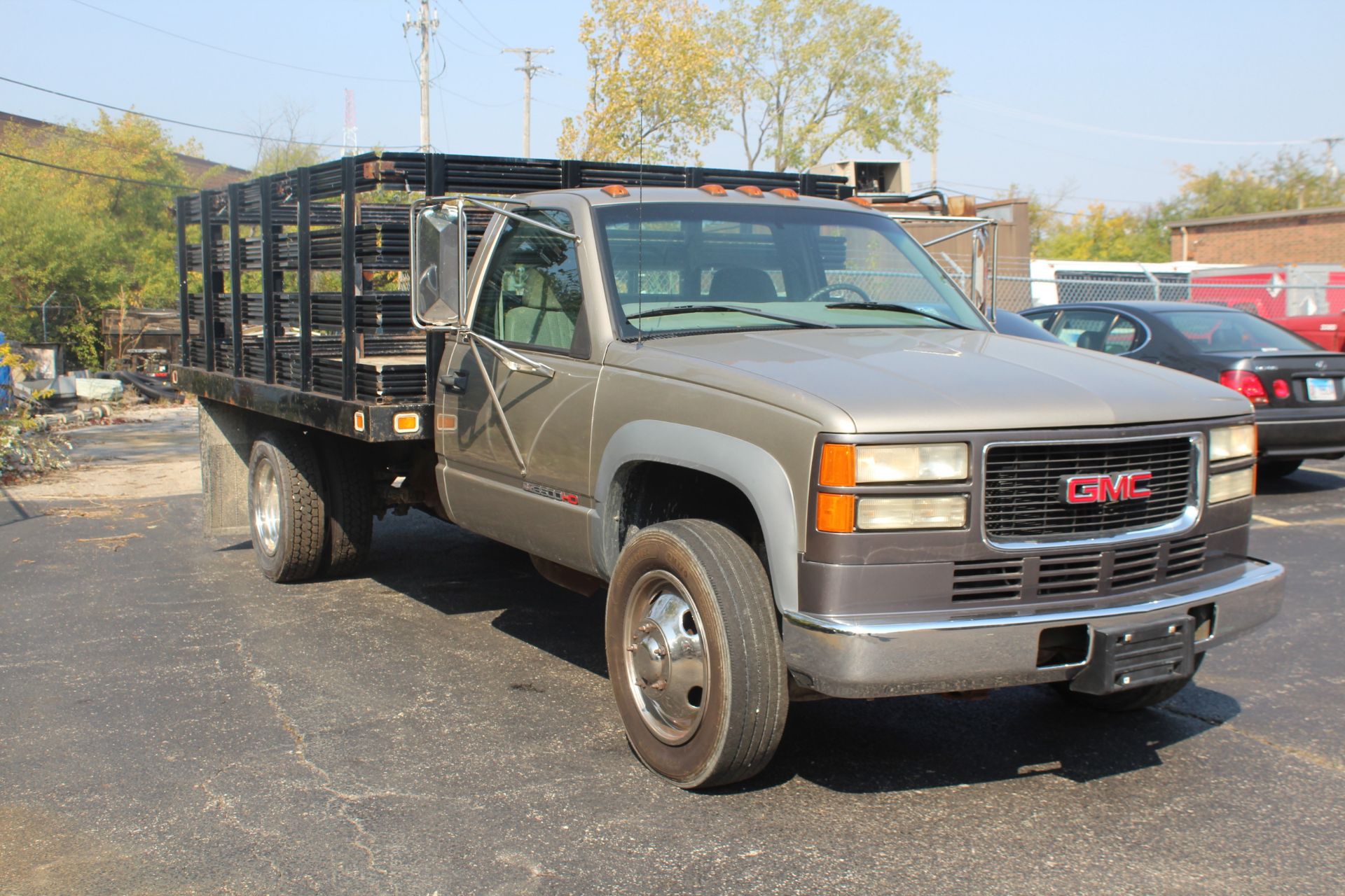 1999 GMC SIERRA 3500 DUALLY STAKE BED TRUCK, 7.4L V-8, VIN 1GDKC34J1XF056858, 109,255 MILES SHOWN ON - Image 3 of 7