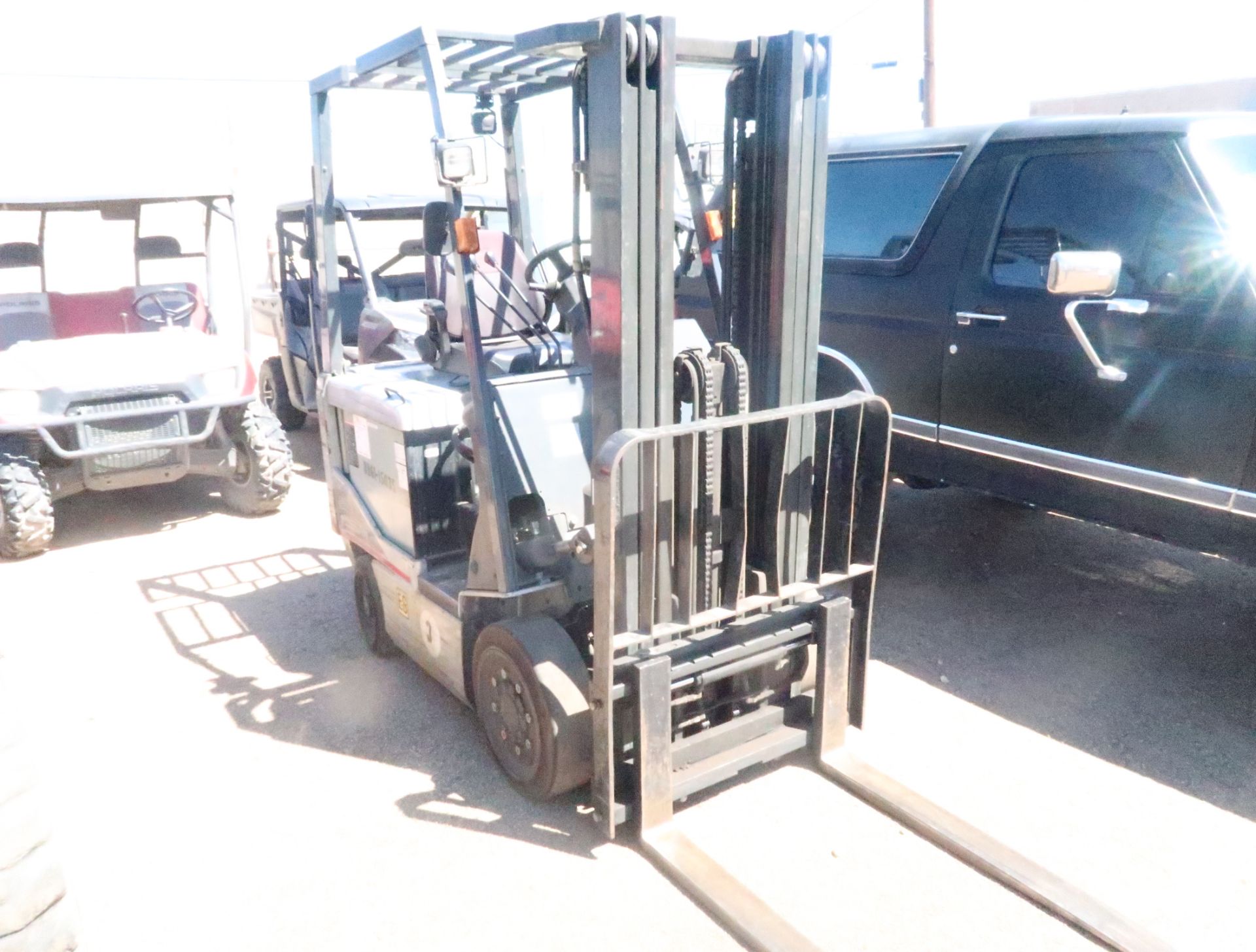 NISSAN 50 ELECTRIC FORKLIFT, W/CHARGER, CUSHION TIRE, 5000# CAP., MDL. MC1B2L25S, SN. D795293, 5,32