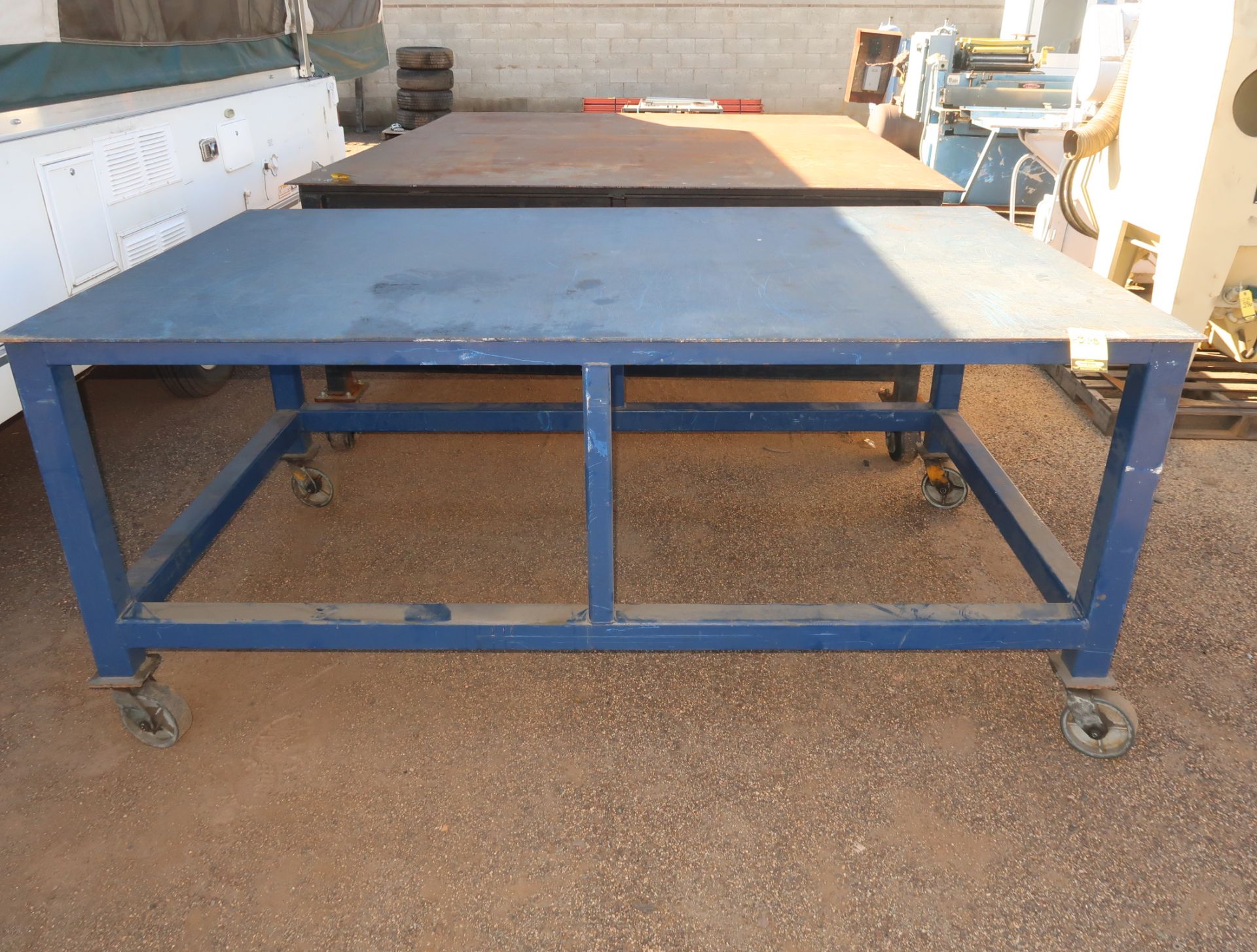 52" X 88" HEAVY DUTY STEEL TABLE ON CASTERS