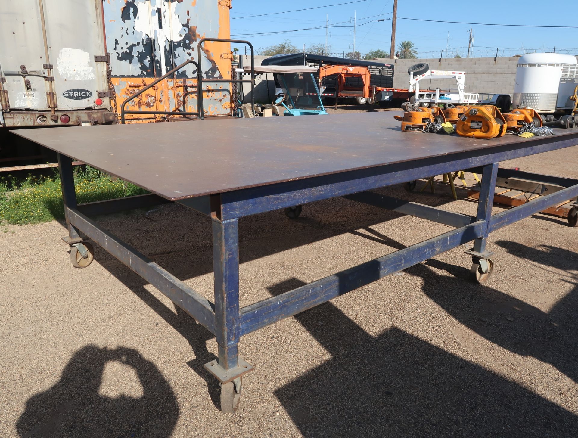 8' X 16' HEAVY DUTY STEEL TABLE ON CASTERS