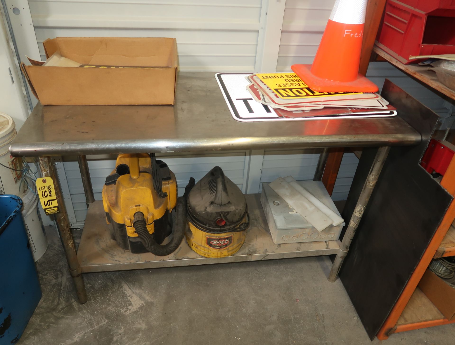 LOT 4' SS TABLE W/SIGNS & SHOP VACS