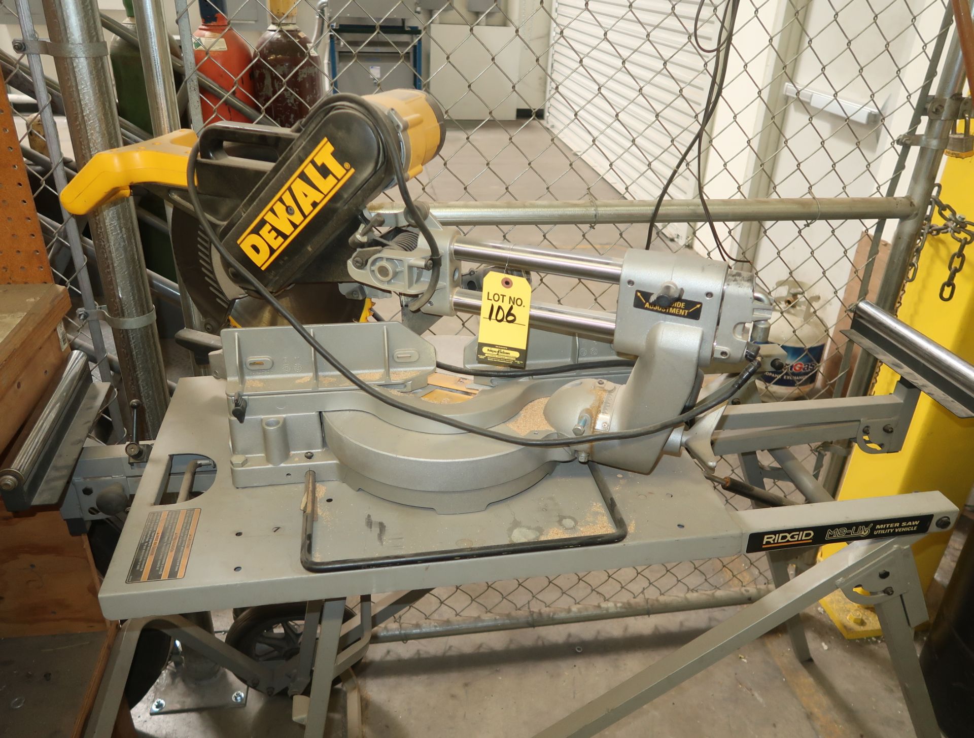 DEWALT SLIDING MITER SAW W/RIDGID STAND