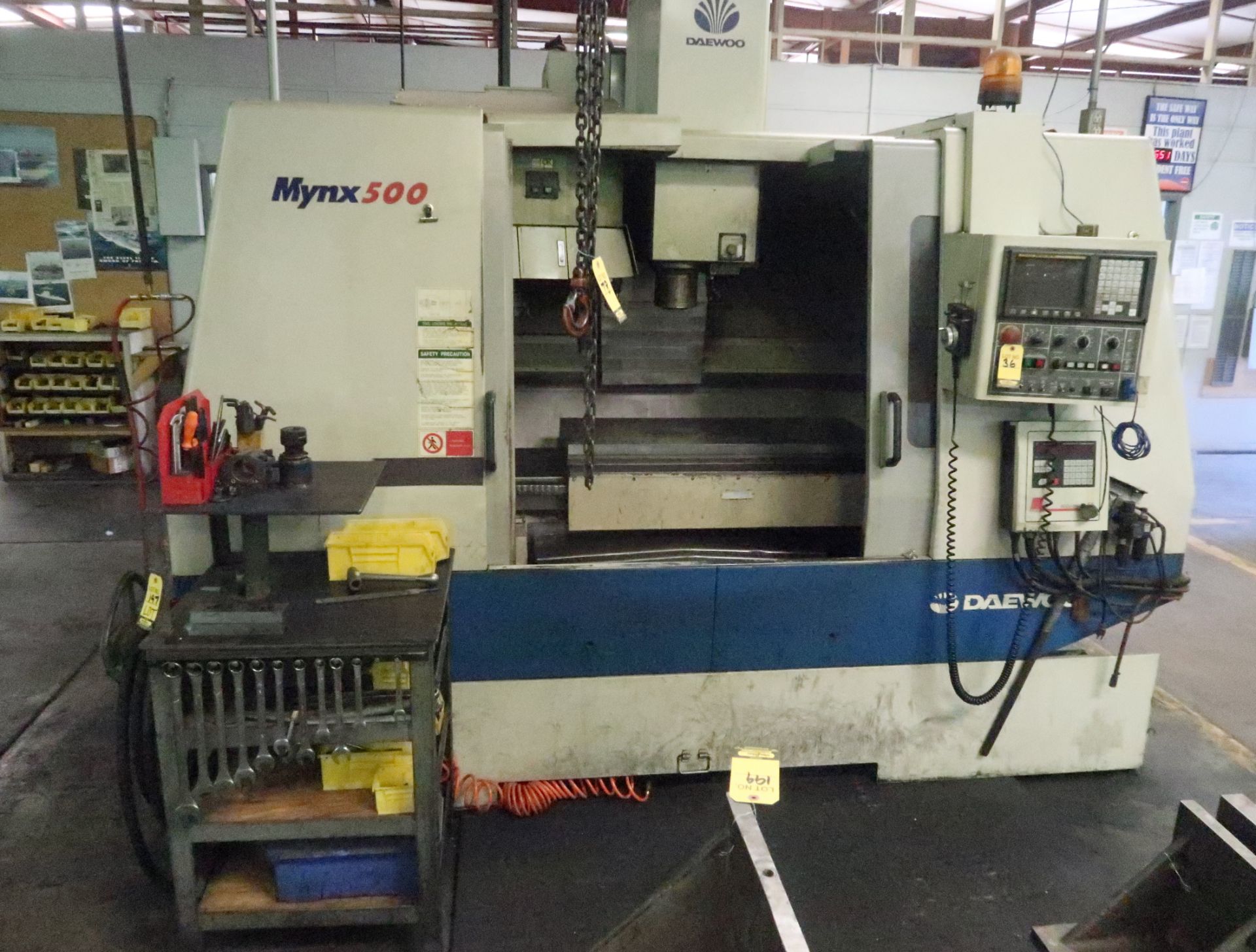 1999 DAEWOO MYNX 500 VERTICAL MACHINING CENTER, 20" X 47" TABLE, 24-STATION ATC, FANUC 21M