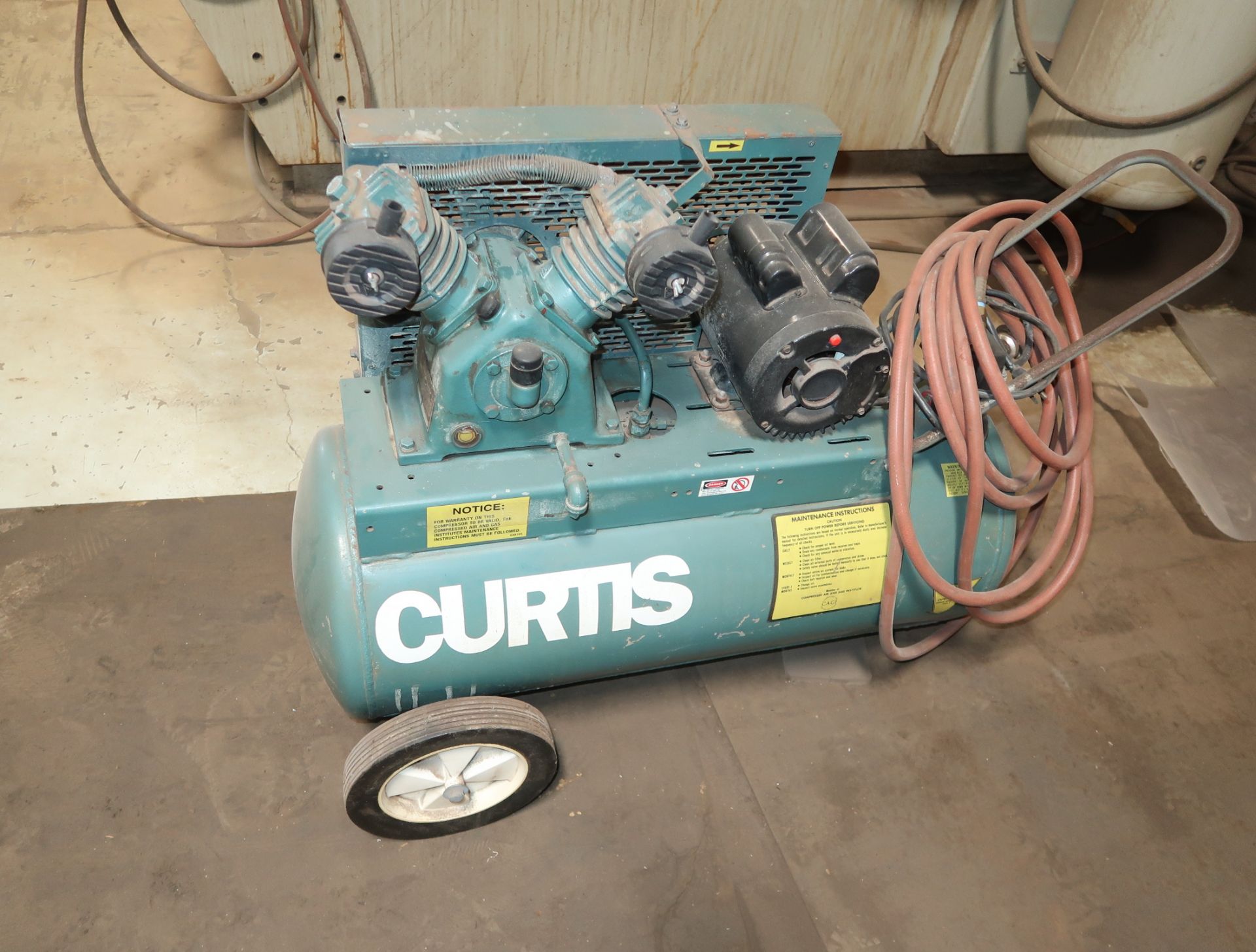CURTIS PORTABLE ELECTRIC AIR COMPRESSOR (LOCATED AT 3201 S. 38TH ST. PHOENIX, AZ.)