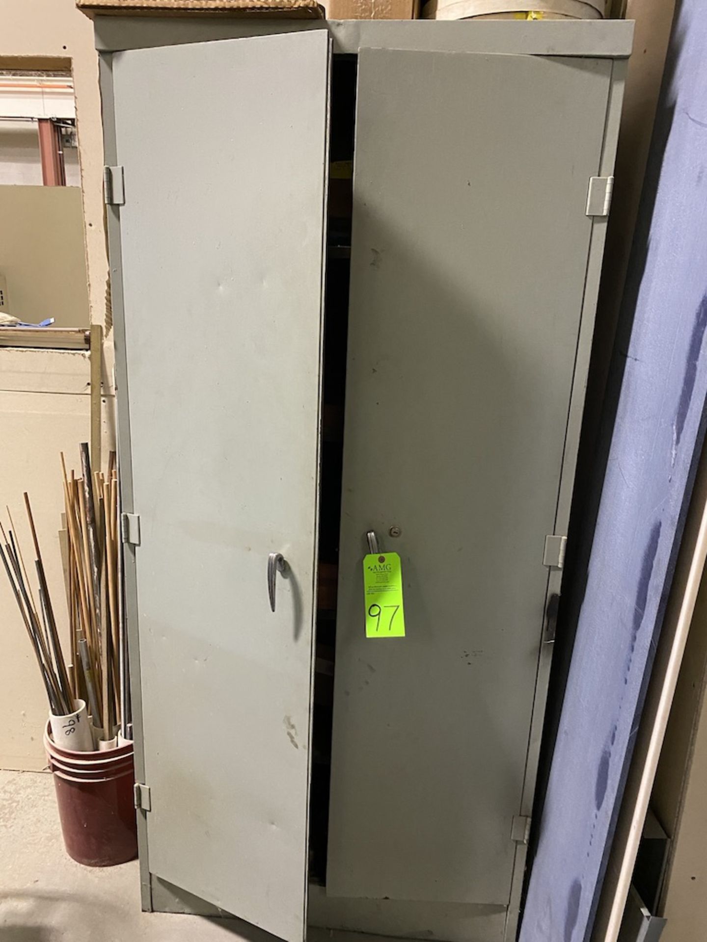 metal 2 door cabinets and contents lot of 2