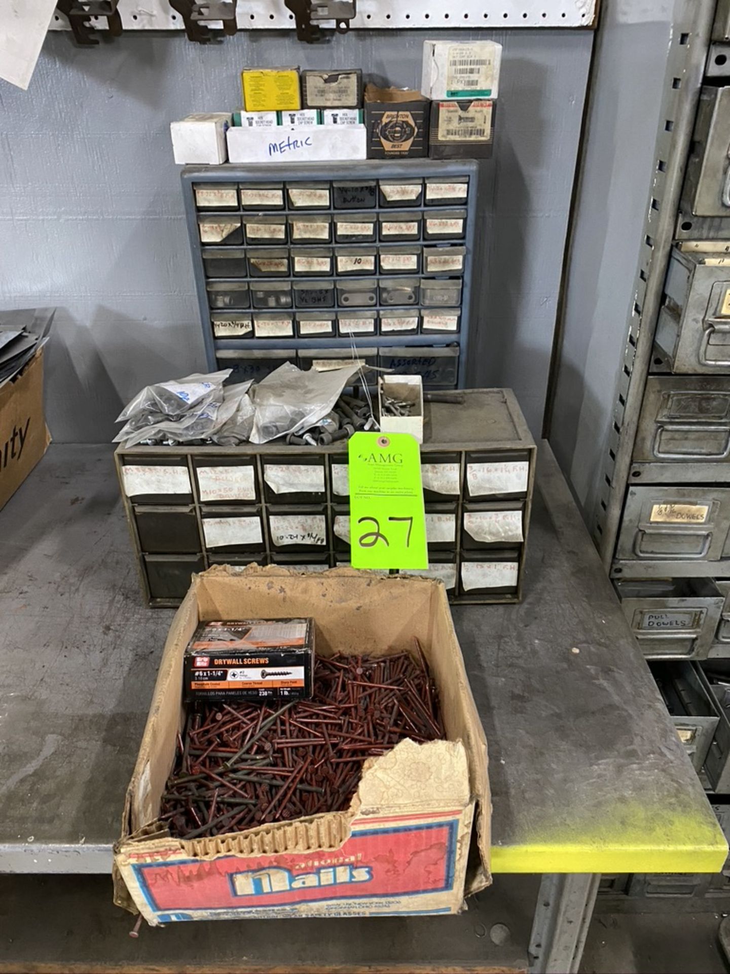 lot of parts bins, (2) bins of nuts & bolts , box nails