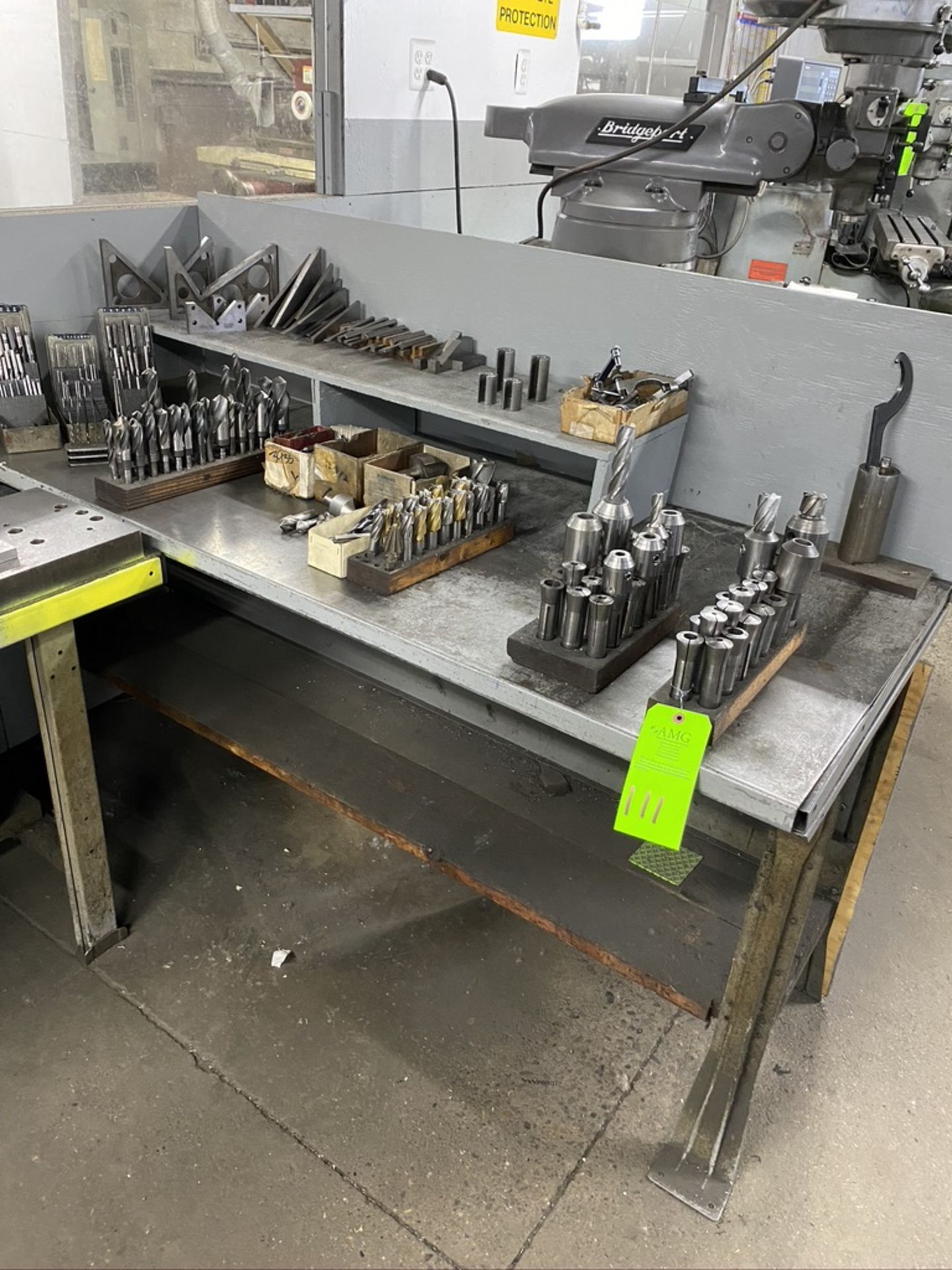 Lot of collets, drills, mills, angle blocks, Including steel table