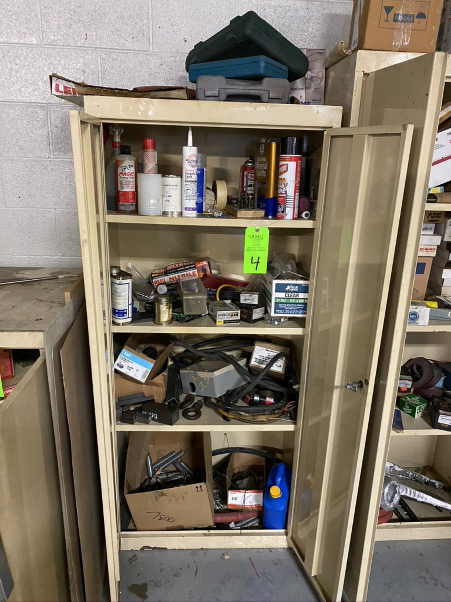 2 Door Metal 5-1/2 tall cabinet and contents