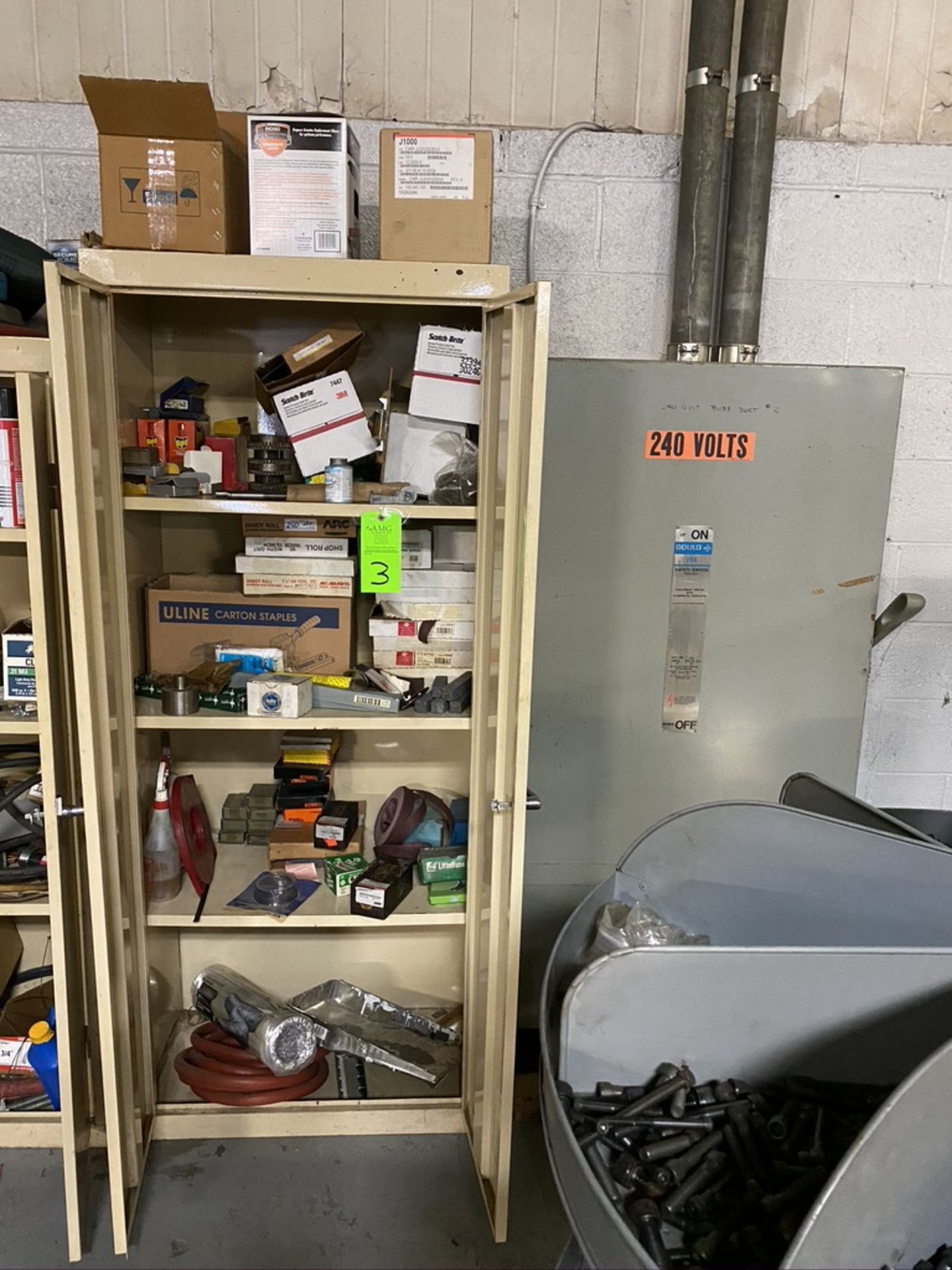 2 Door Metal cabinet and contents