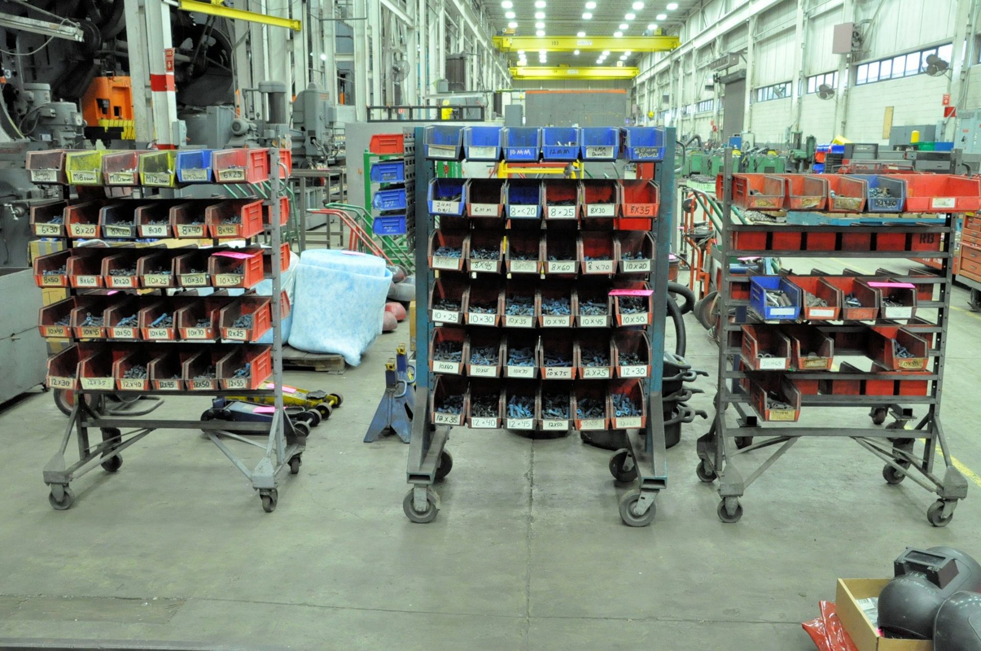 Lot-Portable Bin Racks with Hold Down Setup Hardware and Bins