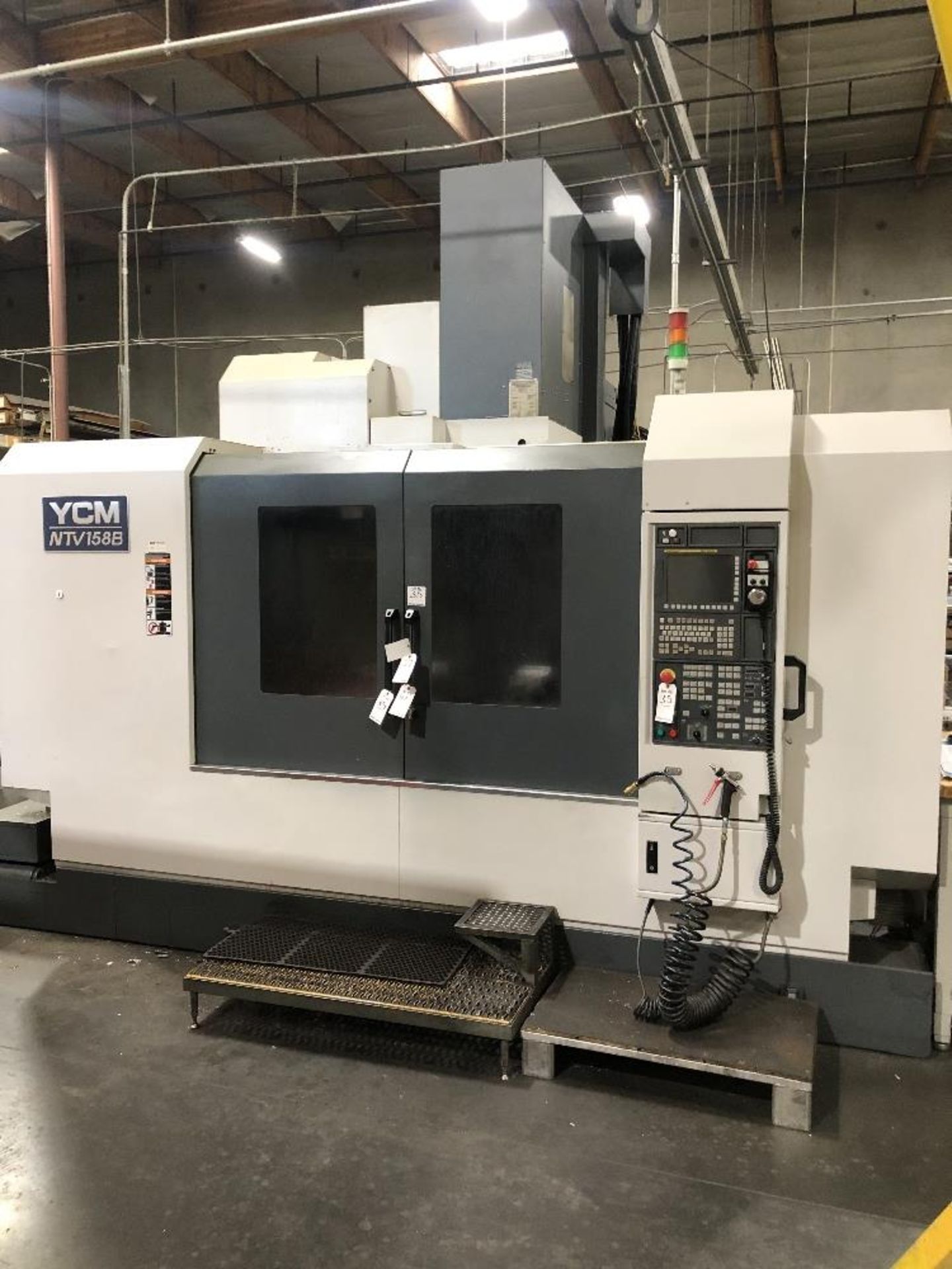 2012 YCM NTV158B Vertical Machining Center- 32 tool ATC, 15,000 rpm spindle speed, 40 taper tooling,