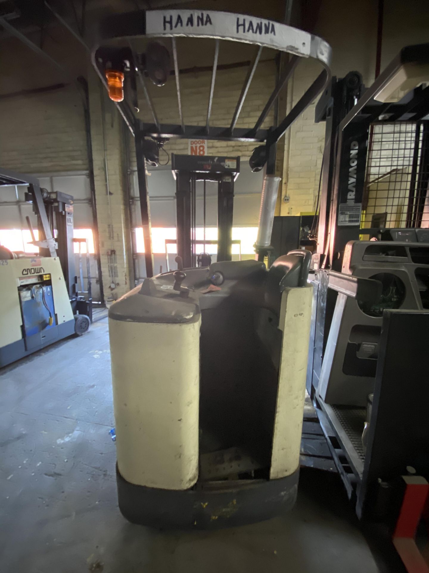 CROWN ELECTRIC STAND UP FORKLIFT